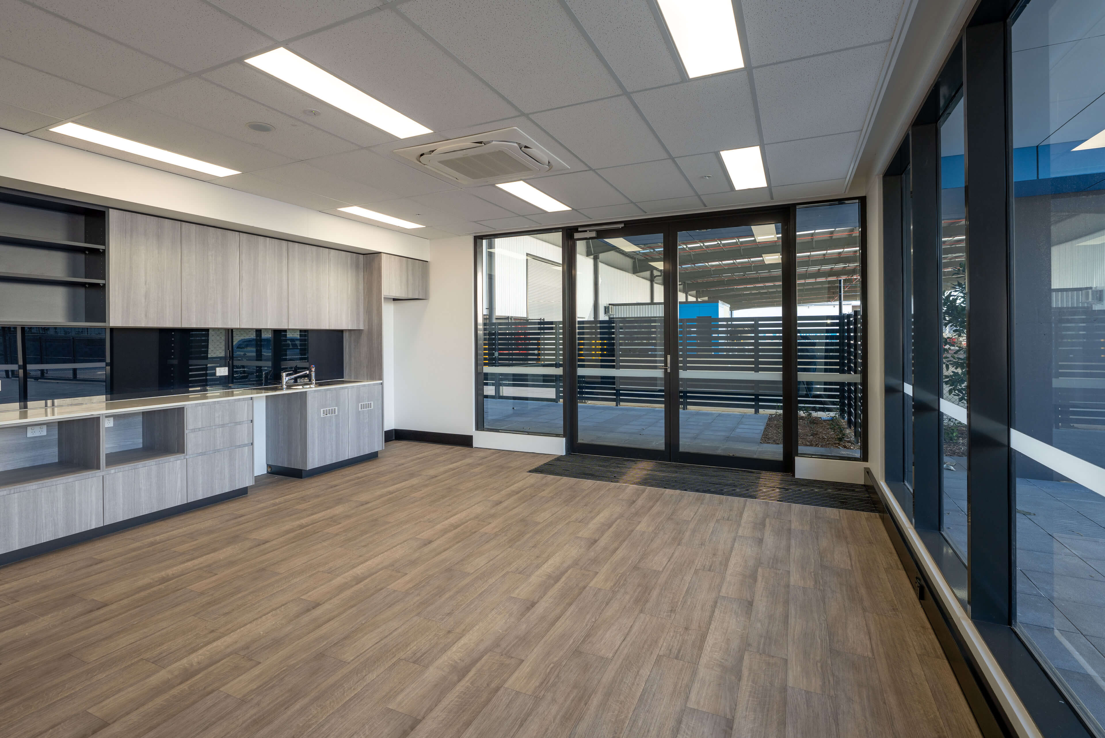 14 kitchen and outside area of commercial space at building 2 wetherill park taylor construction industrial