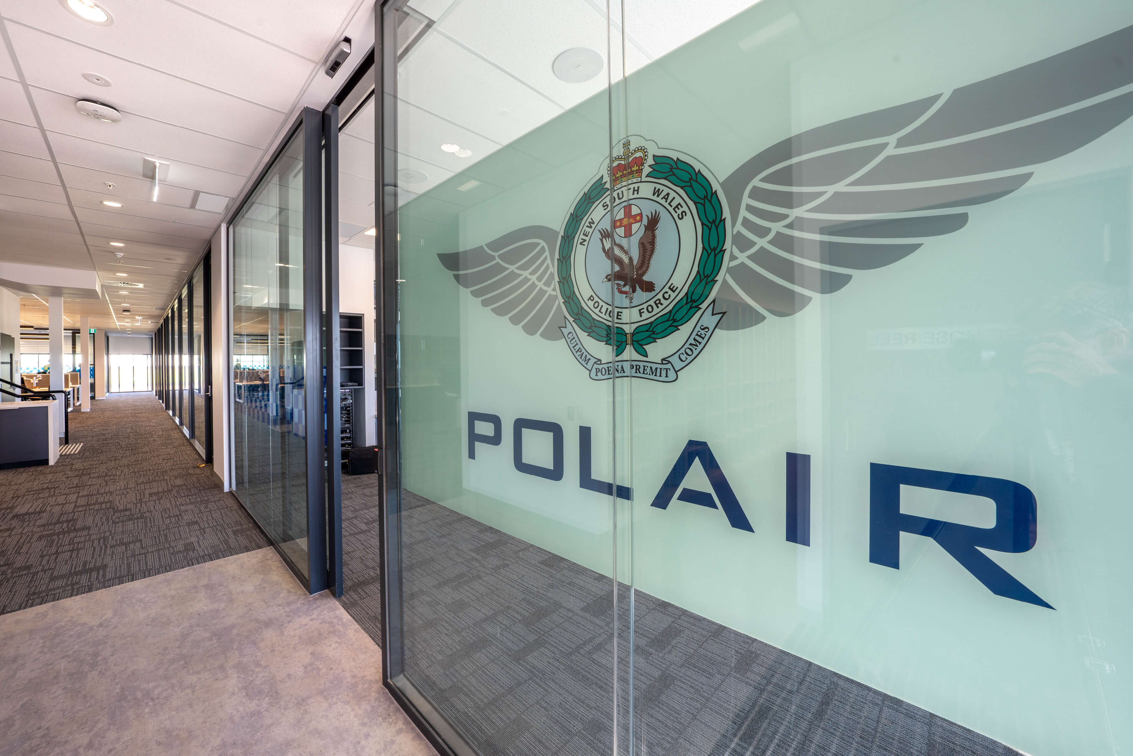 16 polair glazing signage at entrance to office space at polair facility bankstown taylor construction refurbishment and live environments