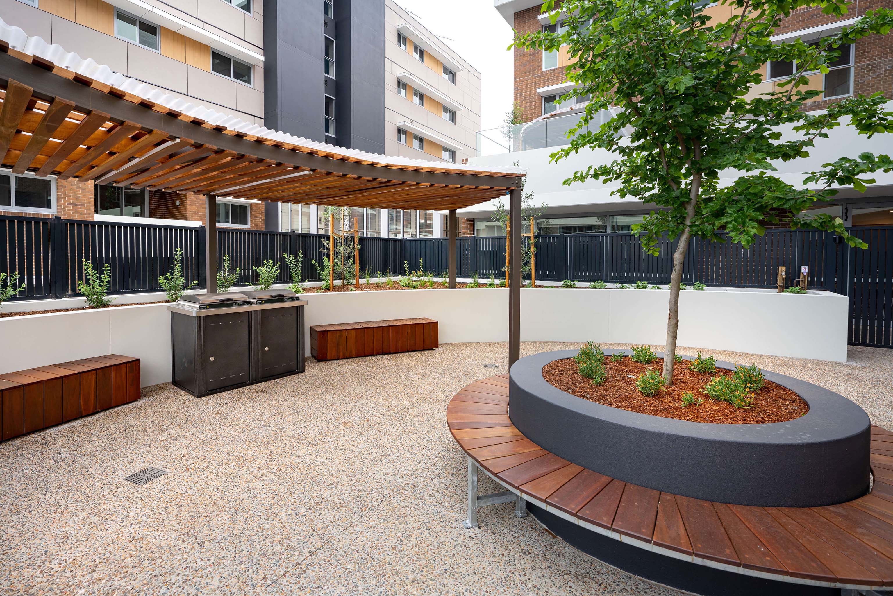 20 outdoor communal bbq facilities with shade area at uniting mayflower westmead taylor construction aged care