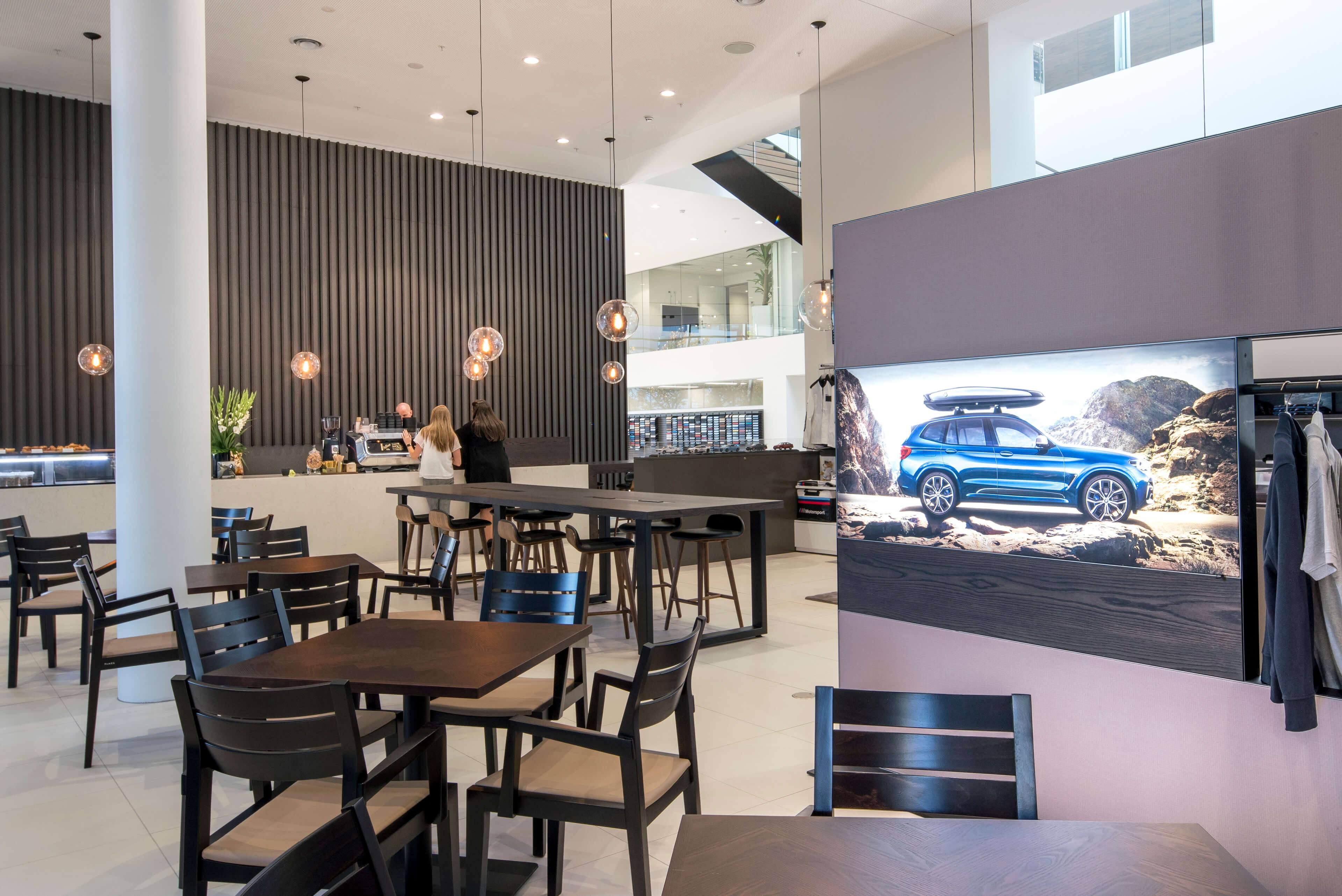 22 cafe and merchandise area at bmw and mini redevelopment sydney taylor construction motor showrooms