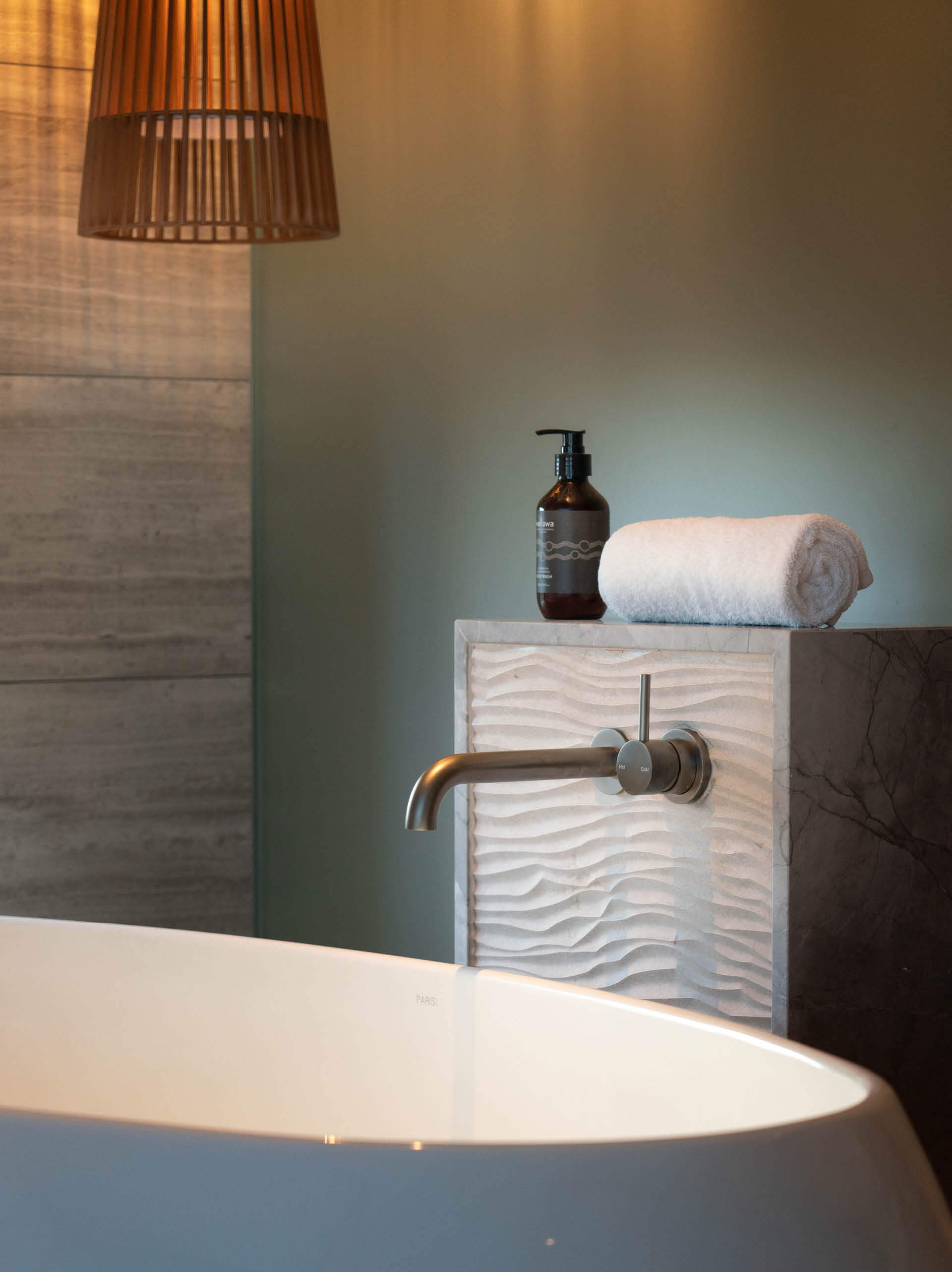 27 accommodation interior detail of bath tap complimentary toiletries at taronga wildlife retreat sydney taylor construction hospitality