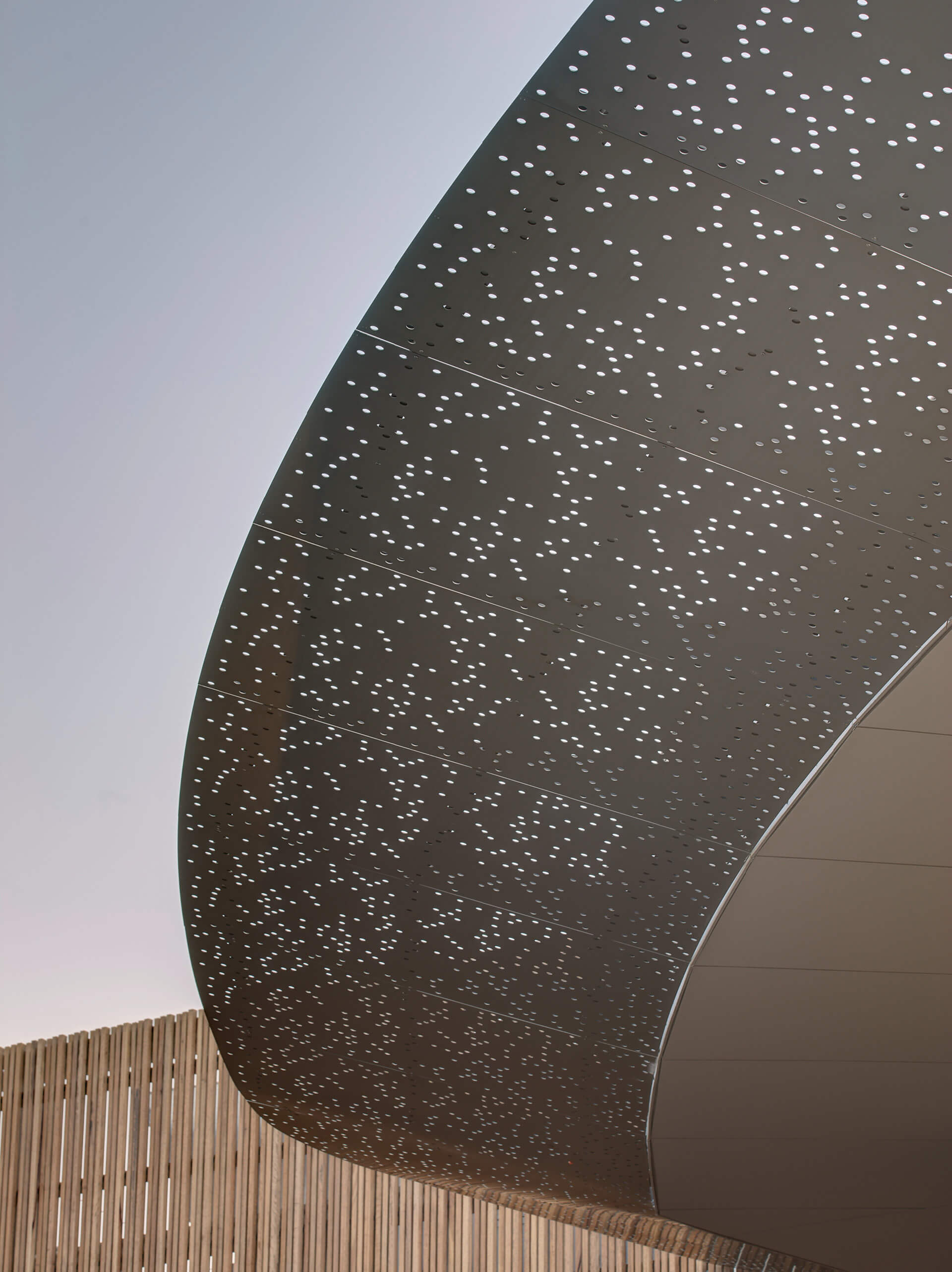 6 curved perforated architectural roof detailing at taronga zoo institute sydney taylor construction education