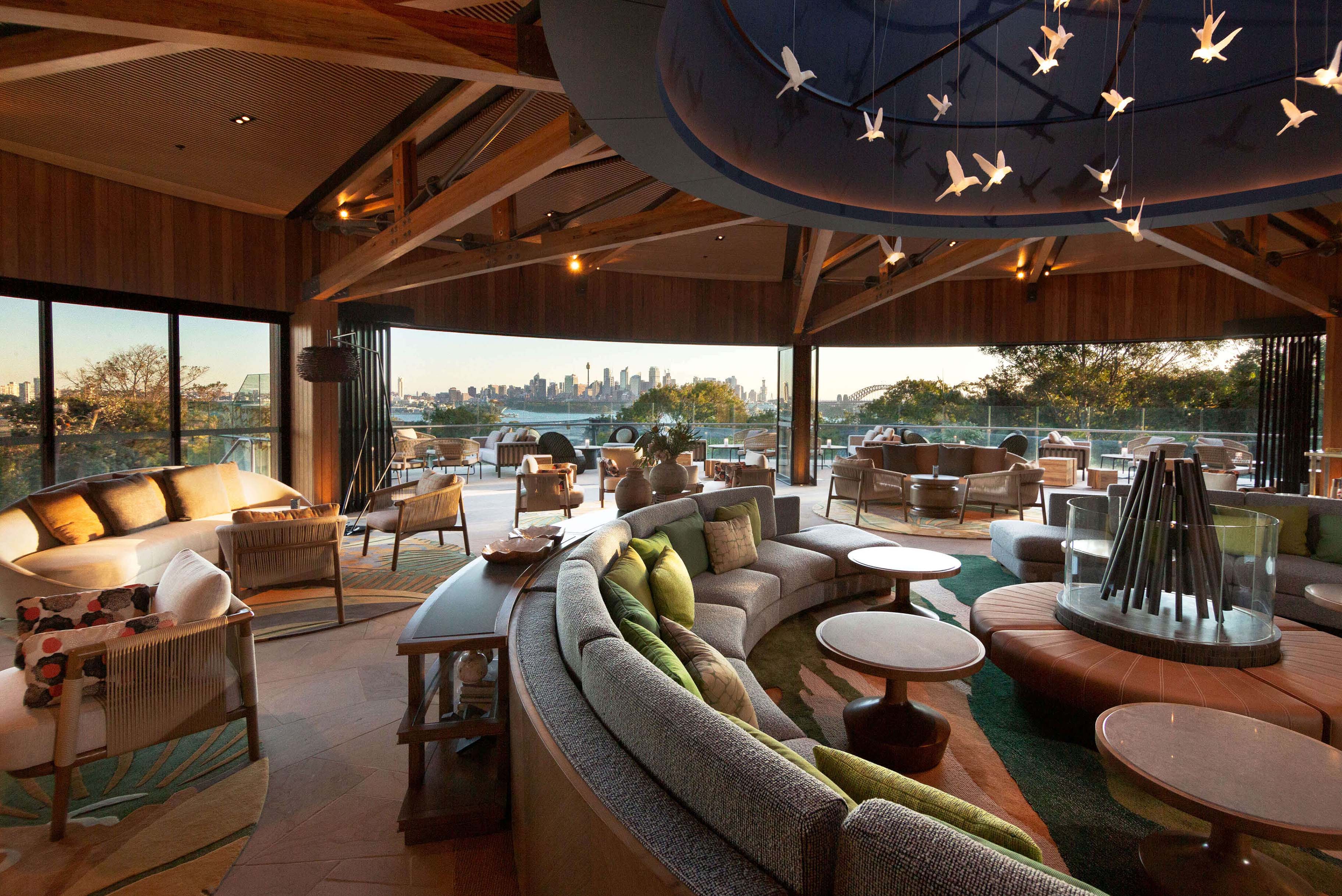 6 guest check in lounge and central seating feature overlooking sydney harbour at taronga wildlife retreat sydney taylor construction hospitality6