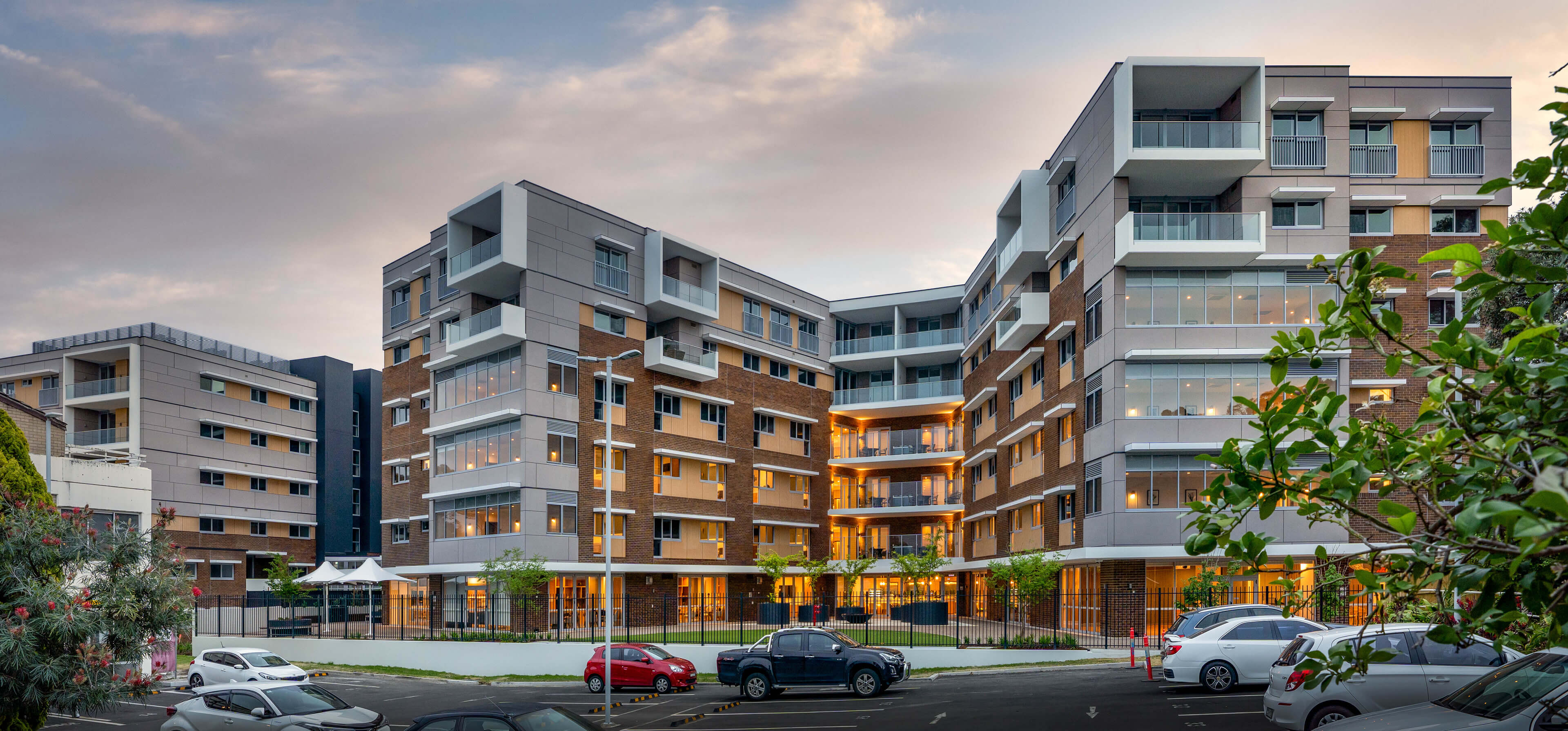 6 panorama of two six storey aged care homes at uniting mayflower westmead taylor construction aged care