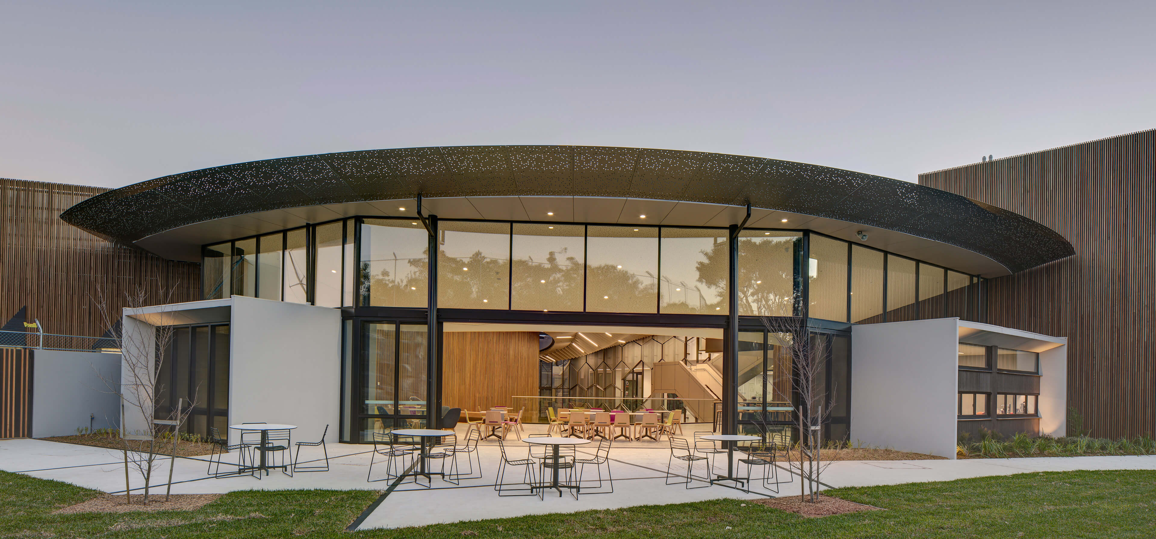 9 exterior view of communal space with seating taronga zoo institute sydney taylor construction education