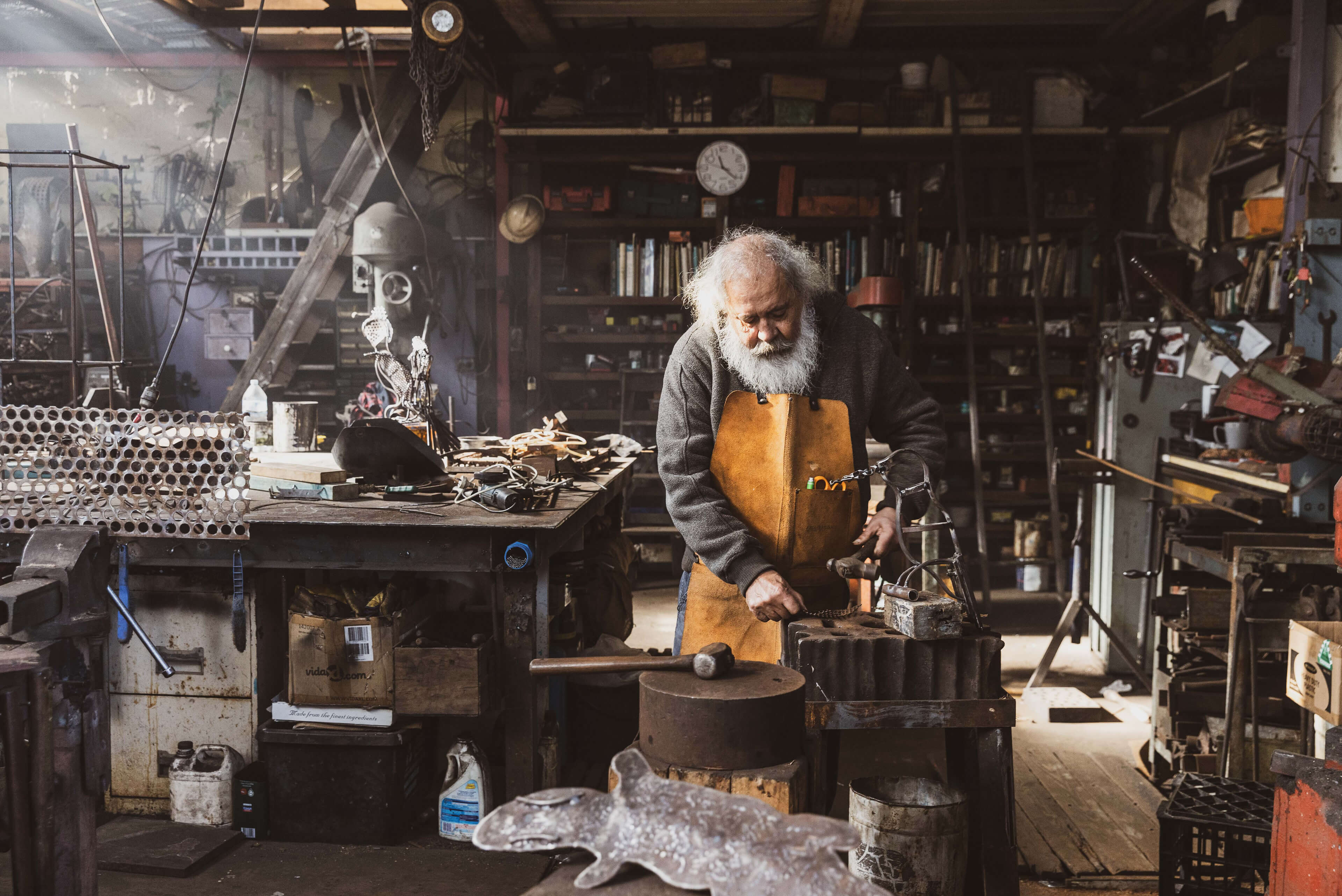 03 diversity and inclusion portrait of boomalli artist joe hurst with full francescos forge workshop in background taylor construction photography