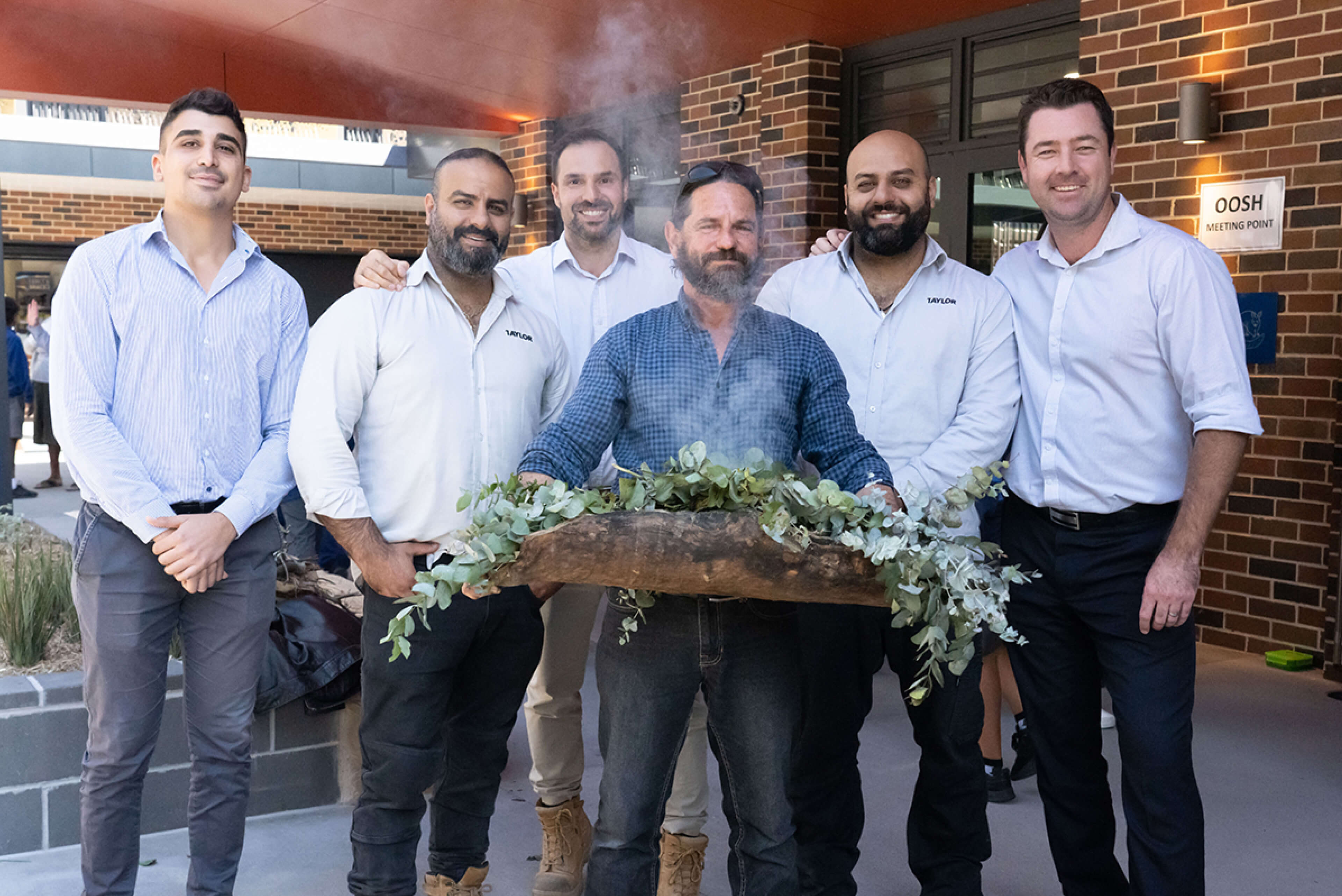 03 diversity and inclusion team taylor and darug people smoking ceremony with taylor team taylor construction photography