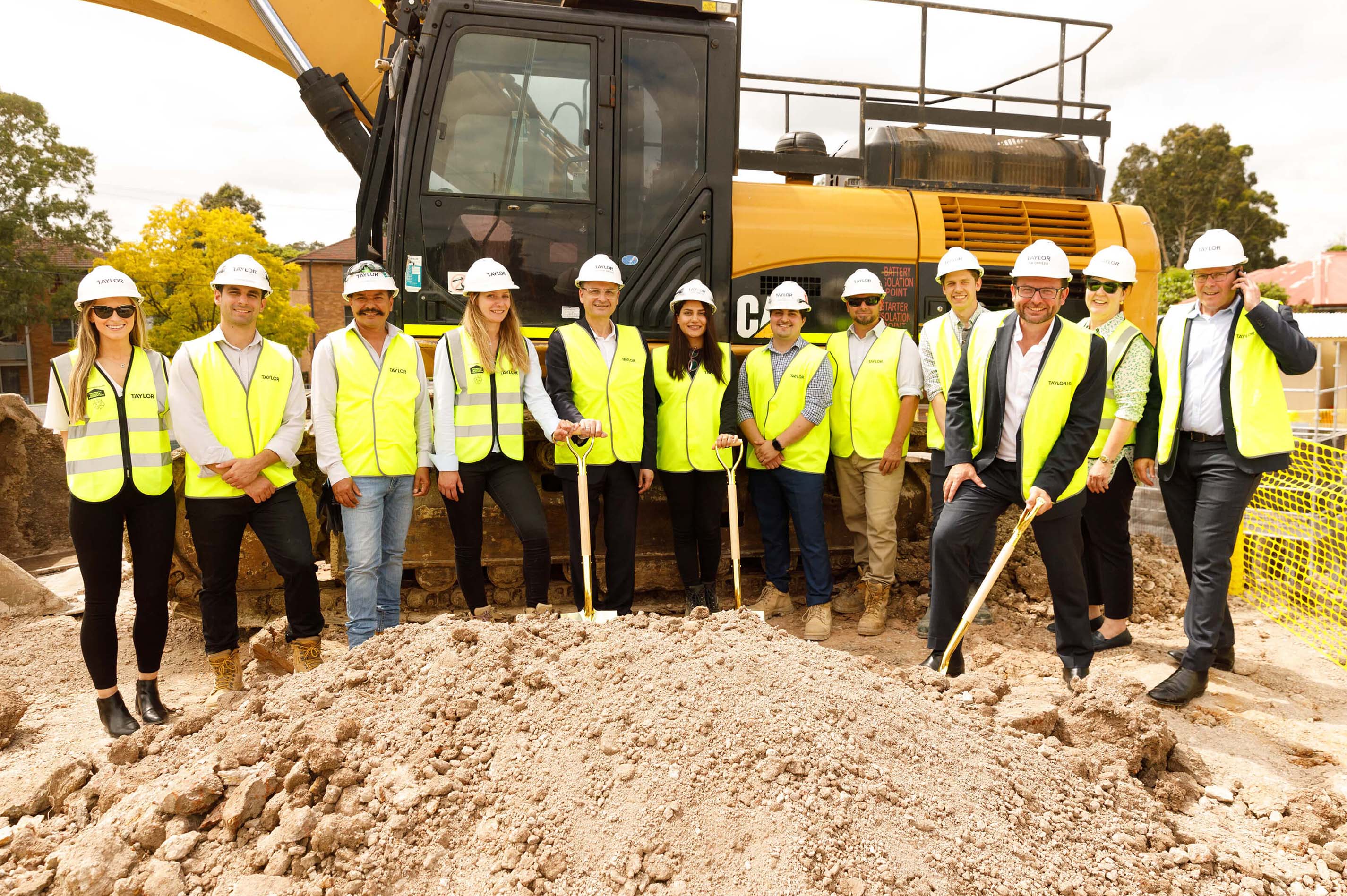 03 large team image at sod turning event taylor news article improving mental health in construction