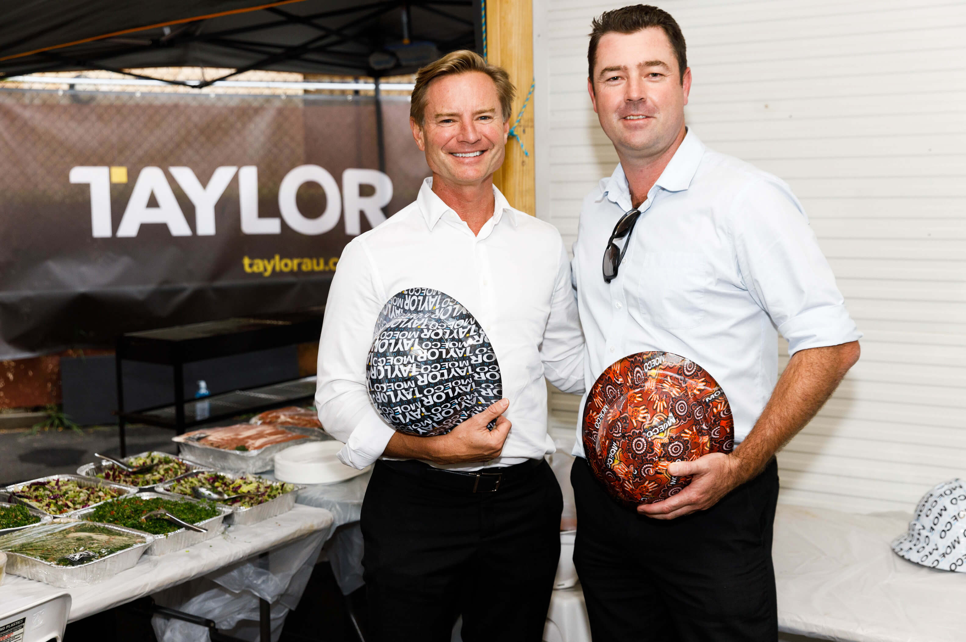 03 mark taylor and ben folkard with gifted bespoke hard hats taylor news article property industry foundation hard hat day