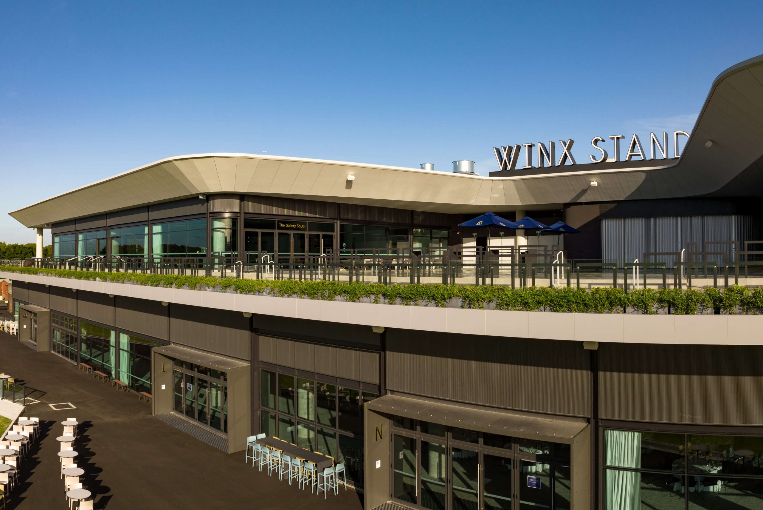 07 external aerial shot daytime venue the winx stand two floors taylor