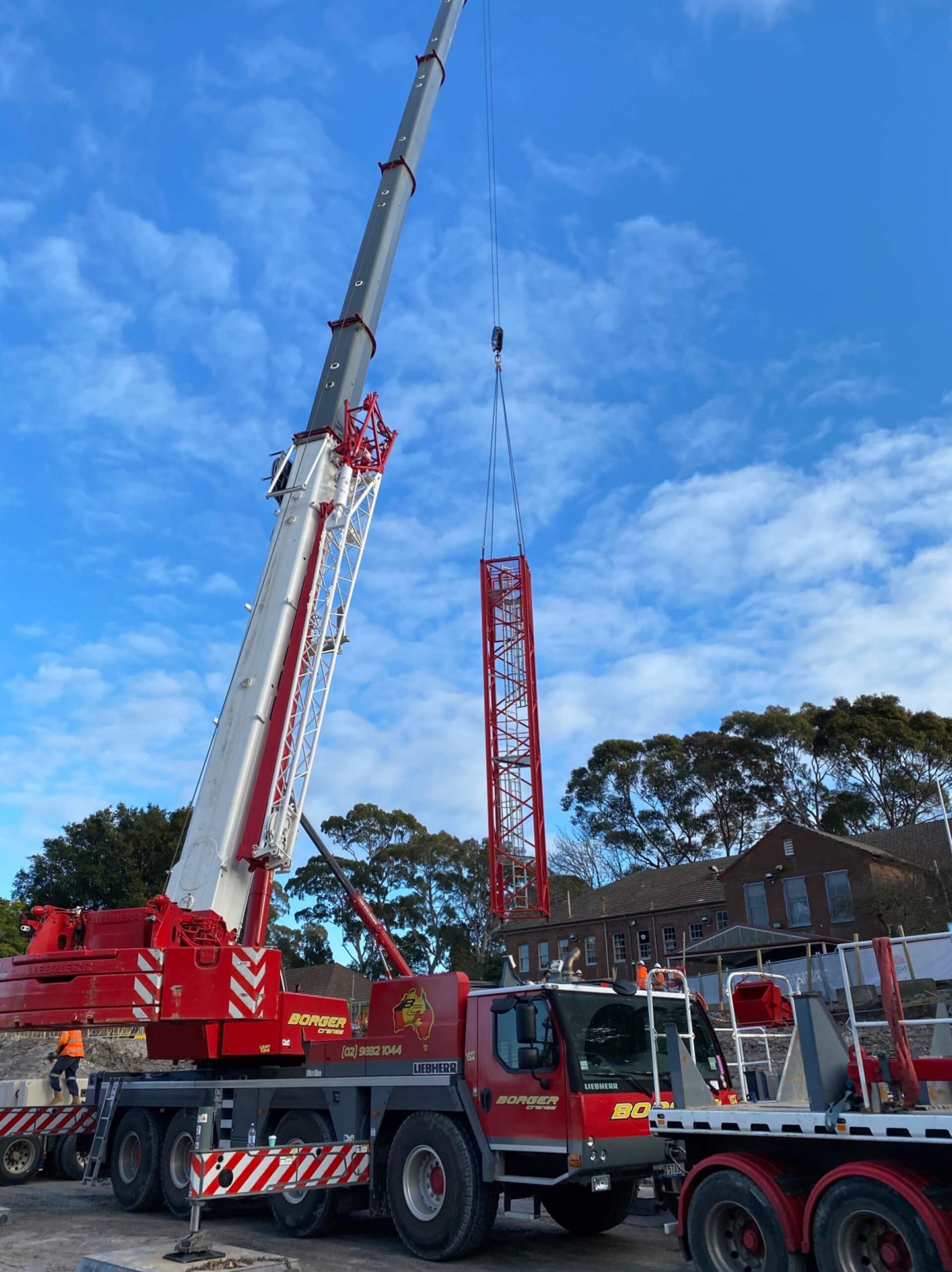 005 candy crane being lifted into place by truck onsite taylor 2