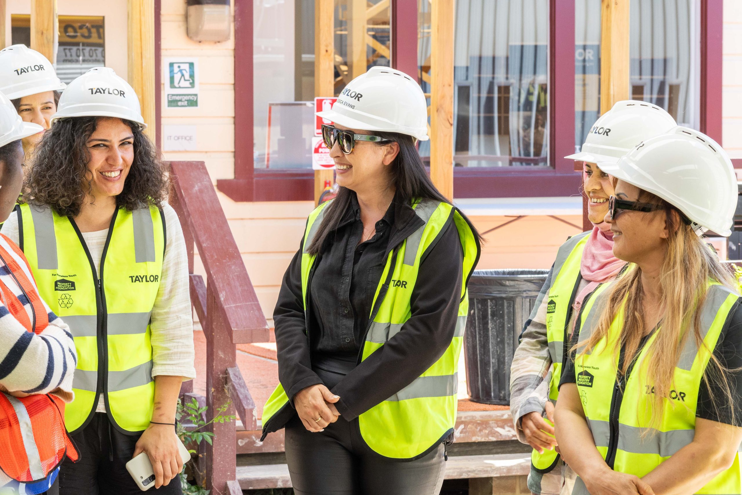 4 women laughing university of newcastle migrant refugee women tour taylor construction education partnership diversity