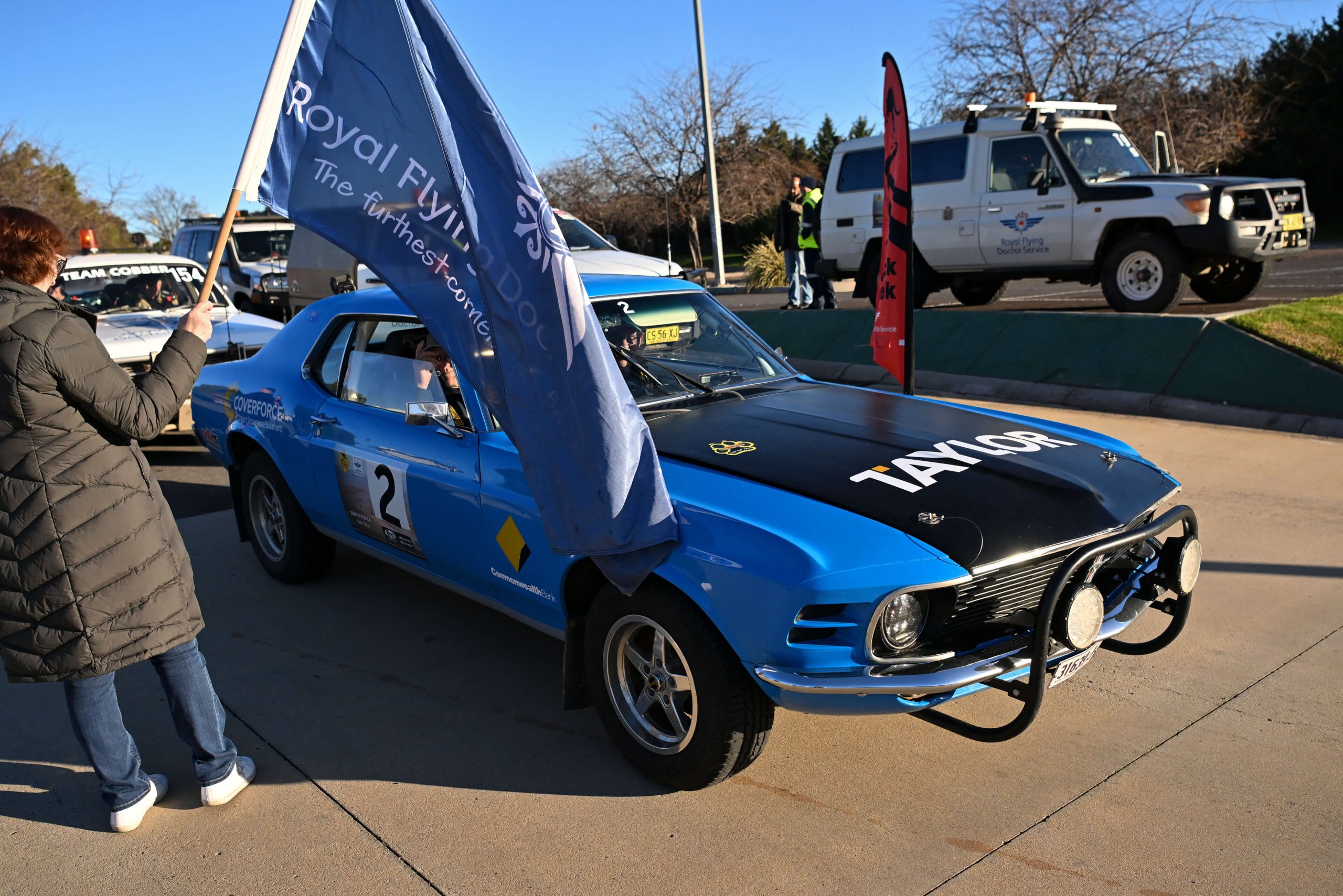 2 finish line clive wickham outback car trek taylor construction charity fundraising